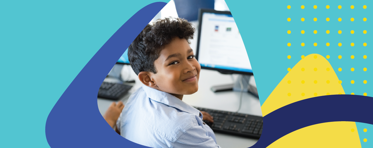 Promotional image for middle school offers featuring a smiling boy in front of a computer