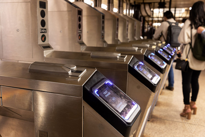 View of turnstiles on the NYC Subway, where MetroCards and OMNY cards are used to enter.