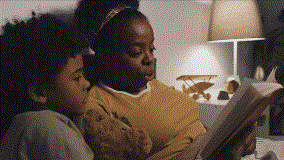 A GIF showing parents and children watching their computer, followed by the Parent University and NYCPS logos