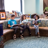 Students reading in school library