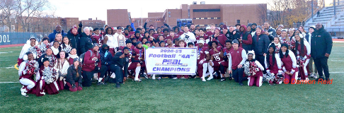 The entire Curtis High School football team, including cheerleaders and coaches, posing together with the official PSAL 4A Football City Championship Banner