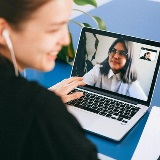 Two people on a video conference